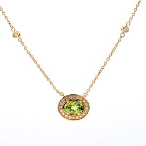 18k YG Halo style grain set necklace set with 0.95ct Oval Aust Parti Sapp with RBC Nat Diamonds G/SI1 (Approx TDW= 0.14ct)