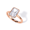 low-profile bezel set solitaire with rose gold metal and radiant shape diamond