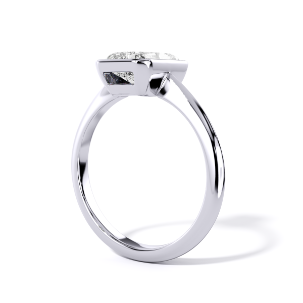 low-profile bezel set solitaire with platinum metal and radiant shape diamond