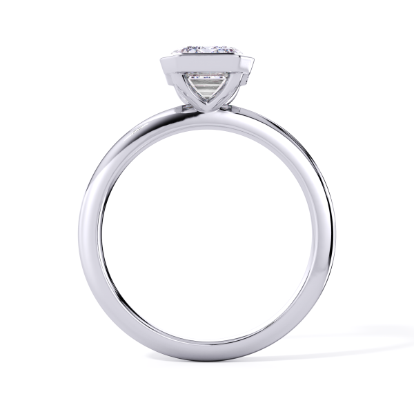 classic bezel solitaire with platinum metal and emerald shape diamond